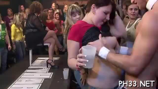 Lesbian orgy of women in the middle of a crowd are satisfied by each other